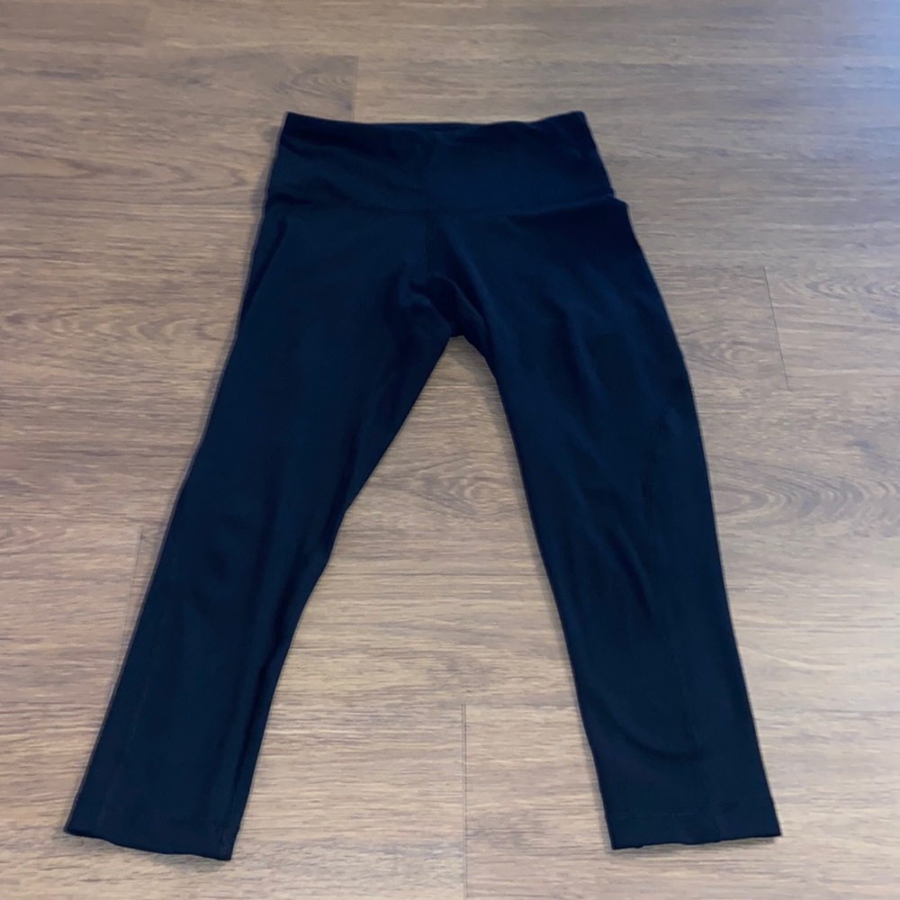 Yogalicious black leggings with cute detail in back of leg.